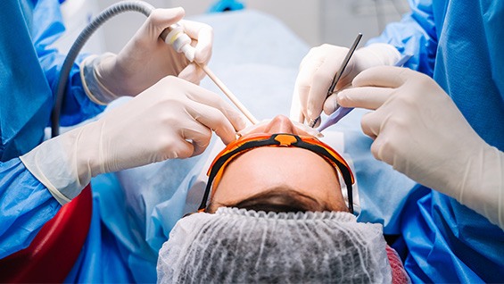 dentists performing surgery 